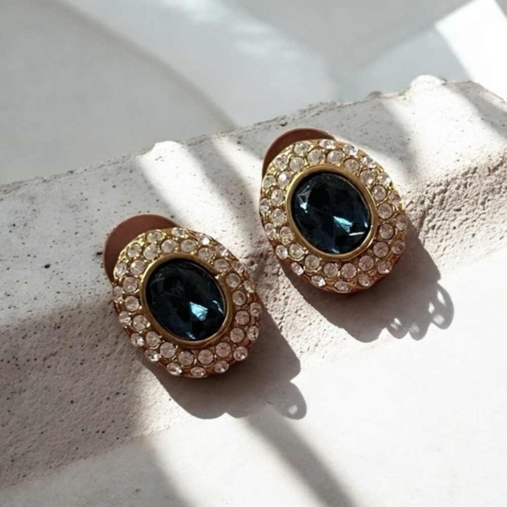 Signed ROMAN Blue sapphire clear Rhinestone oval Gold Tone Earrings..
